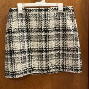 Black and off white. Above the knee.